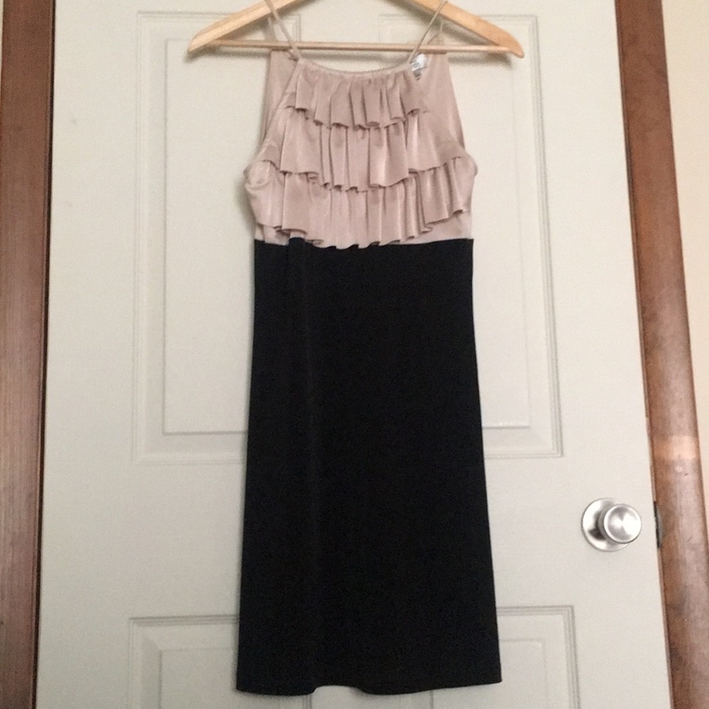 Champagne ruffle and black dress